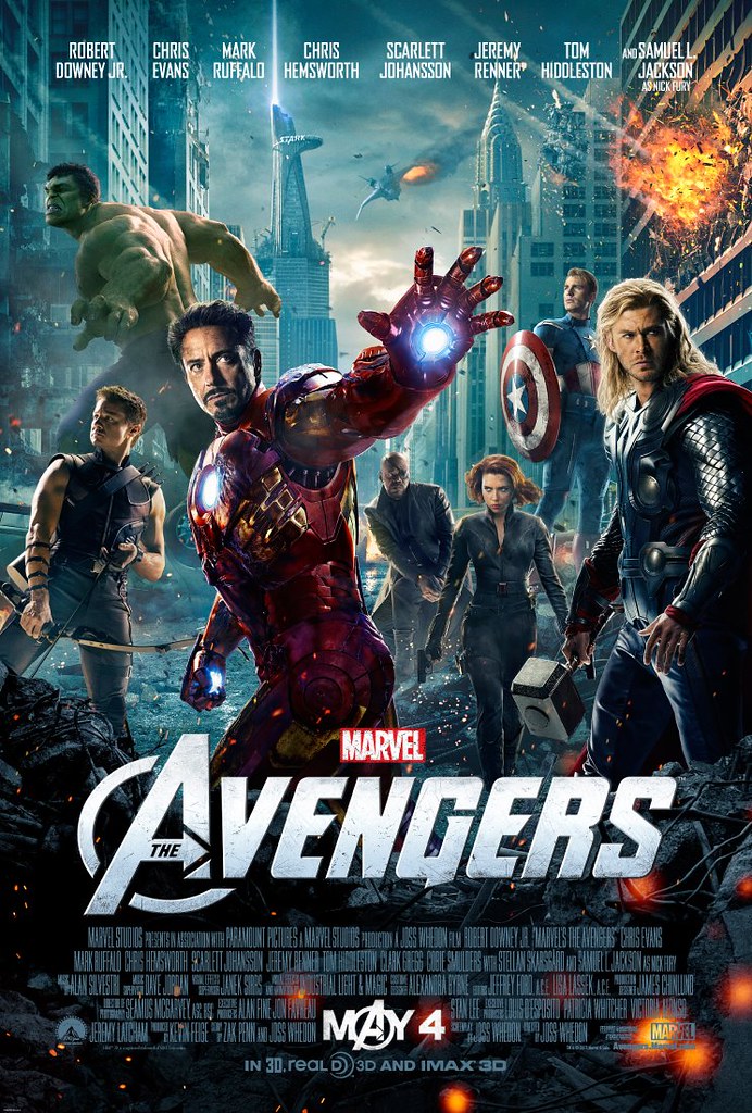 One of the original 'The Avengers' movie posters. At the top, the main cast is listed from left to right as: Robert Downey Jr, Chris Evans, Mark Ruffalo, Chris Hemsworth, Scarlett Johansson, Jeremy Renner, Tom Hiddleston and Samuel L Jackson. Beneath, we see The Hulk, Hawkeye, Nick Fury, Black Widow, Captain America and Thor posed in battle against a background of a battered, terrorised New York City. At the bottom of the image, there is the title 'Marvel: The Avengers' and the original release date: May 4th, 2012.
